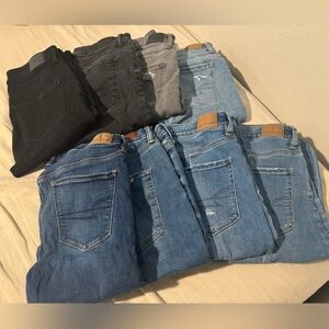 EIGHT PAIRS OF AMERICAN EAGLE JEANS